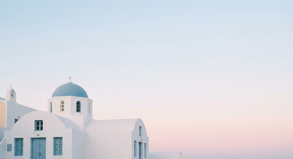 Griechenland Panorama mit weissen Häusern und blauem Meer